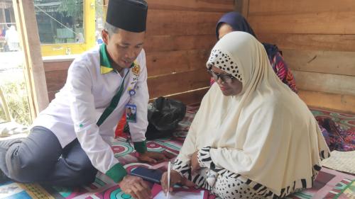 Serah Terima Bantuan Bedah Rumah Kepada Ibu Rusiyah